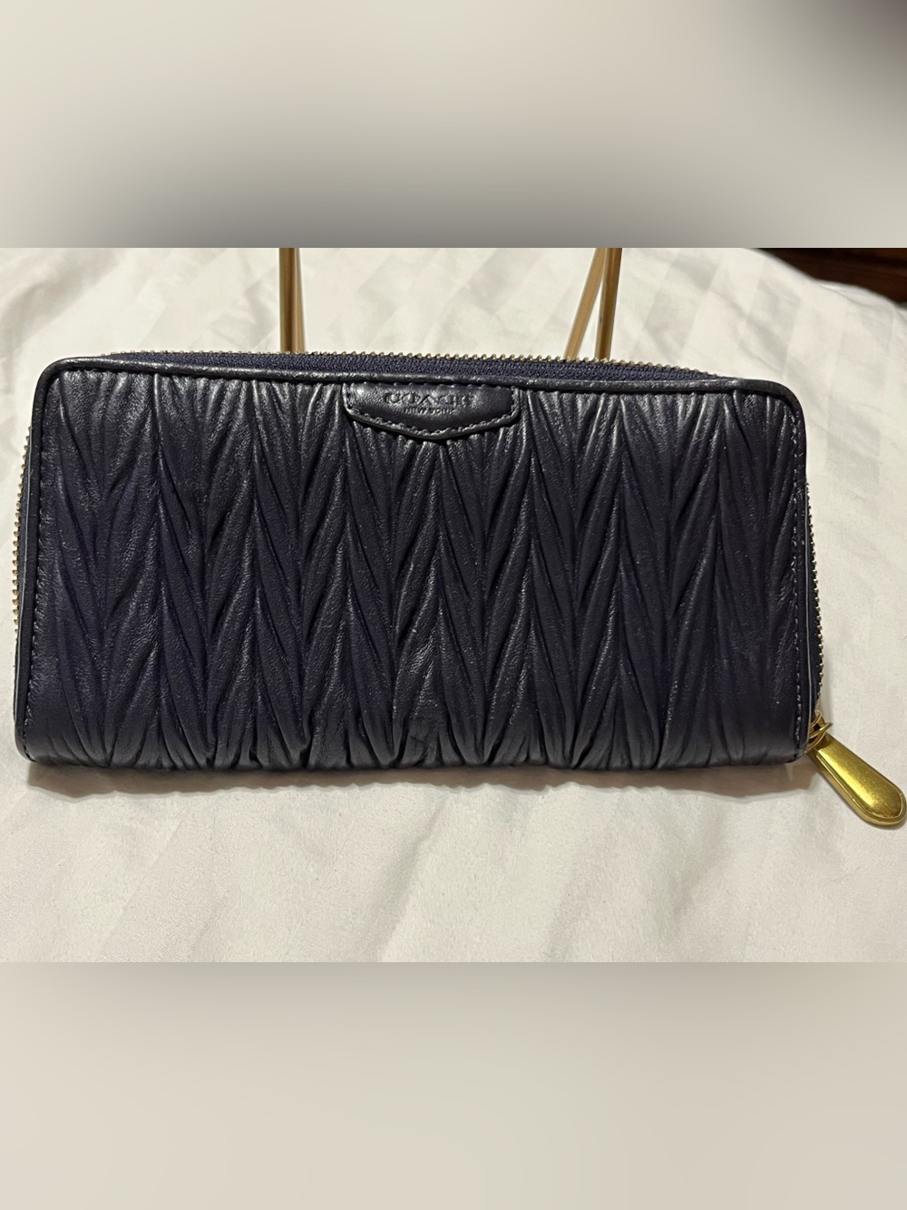 Coach Quilted Navy Zip Wallet with Gold Hardware
G-08